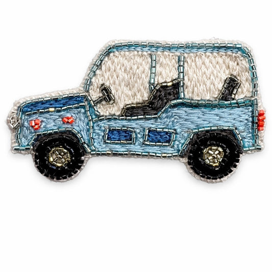 MOKE Brooch